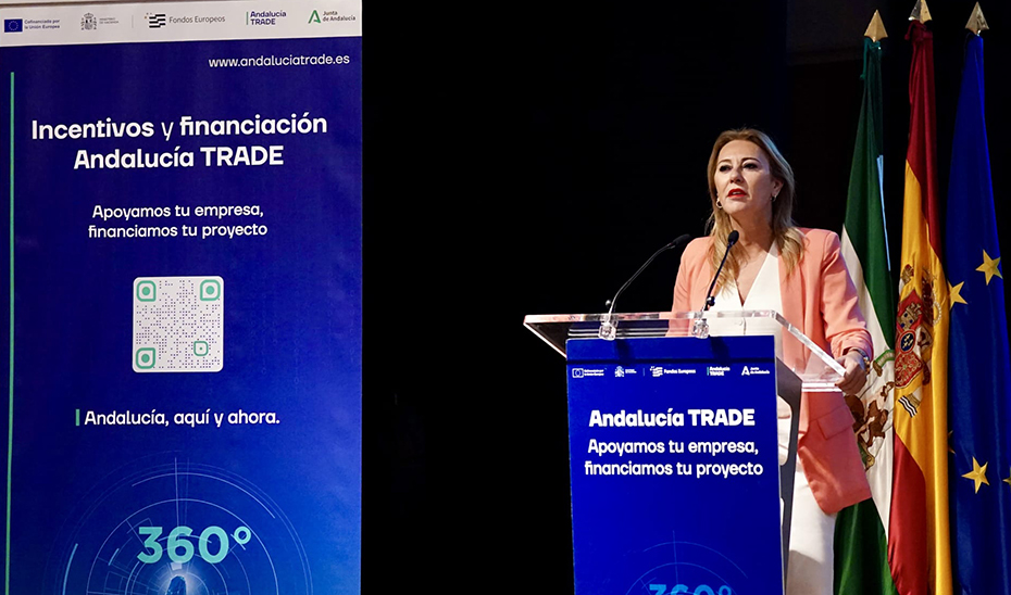 Carolina España interviene en el acto de presentación de incentivos a empresas de Andalucía TRADE celebrado en Málaga.